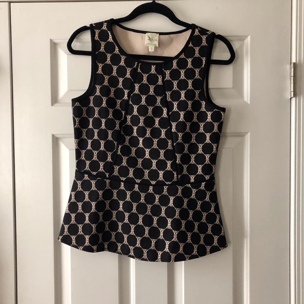 Peplum sleeveless top